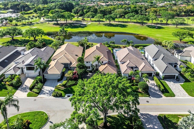 aerial view with a residential view and a water view