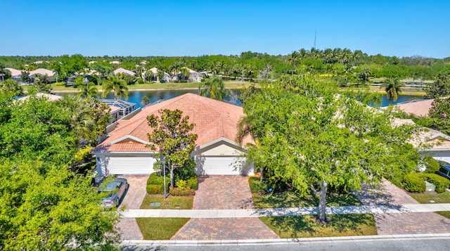 birds eye view of property featuring a water view