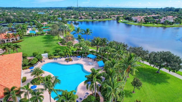 birds eye view of property with a water view