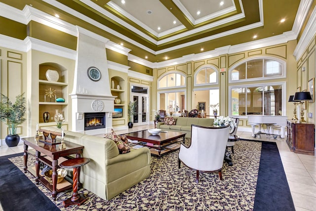 tiled living room with built in features, a high ceiling, a fireplace, recessed lighting, and ornamental molding