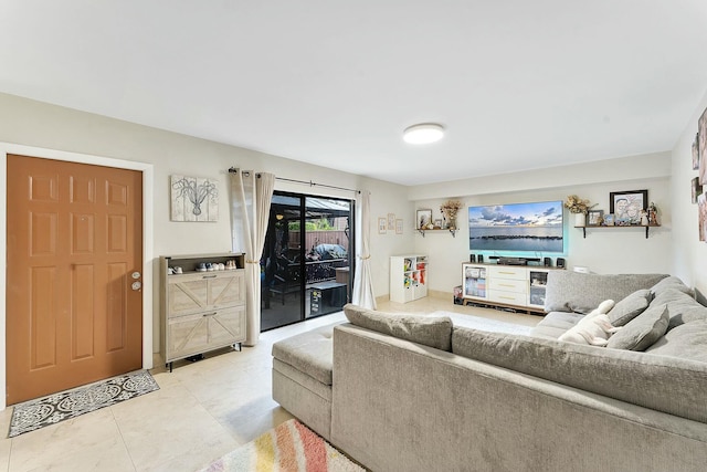 living room with light tile patterned flooring