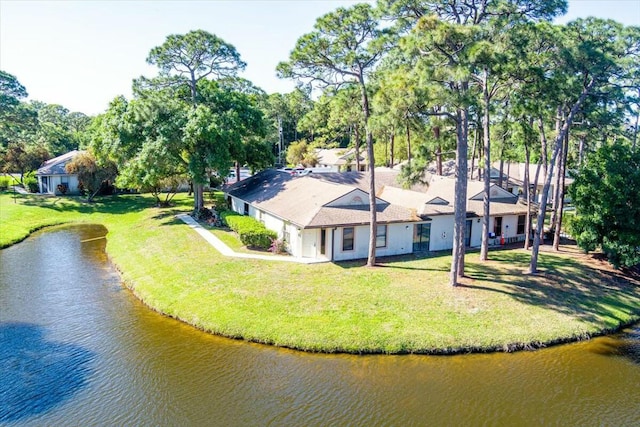 bird's eye view with a water view