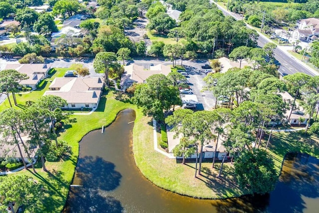 bird's eye view with a residential view and a water view