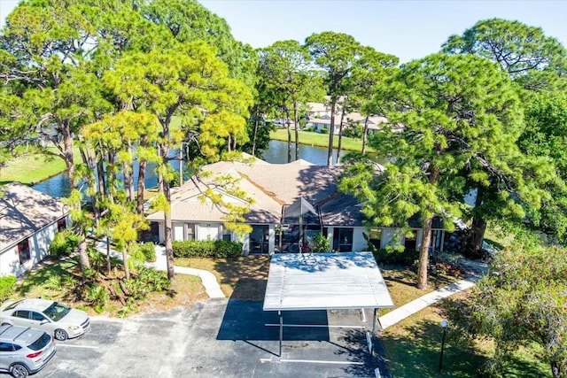 drone / aerial view with a water view