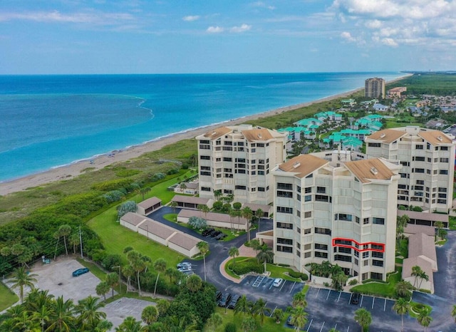 aerial view with a beach view and a water view