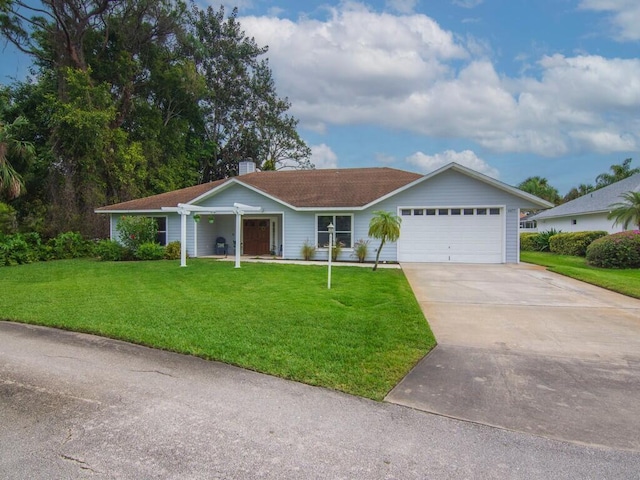 ranch-style house with a front lawn, an attached garage, driveway, and a chimney