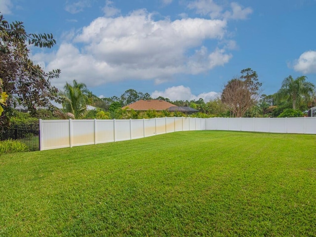 view of yard with fence