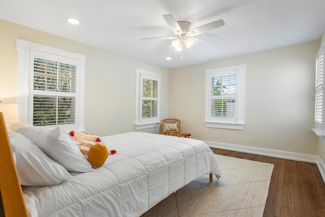 bedroom with recessed lighting, ceiling fan, baseboards, and wood finished floors