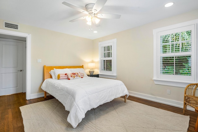 bedroom featuring visible vents, recessed lighting, baseboards, and wood finished floors