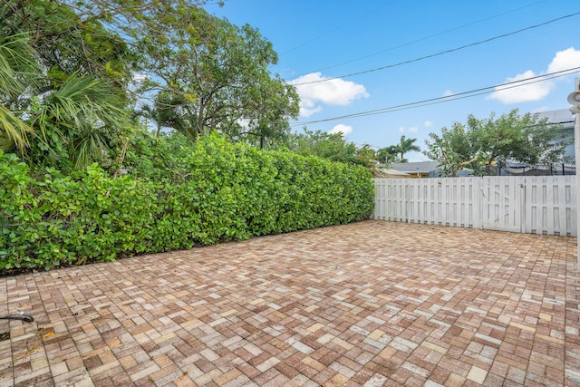 view of patio / terrace featuring fence