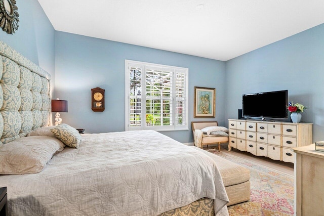 396 Kelsey Park Dr, Palm Beach Gardens, FL 33410 - bedroom featuring wood finished floors