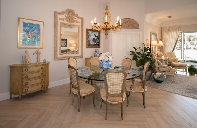 dining room featuring an inviting chandelier, crown molding, and baseboards