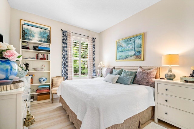 396 Kelsey Park Dr, Palm Beach Gardens, FL 33410 - bedroom featuring light wood-style flooring