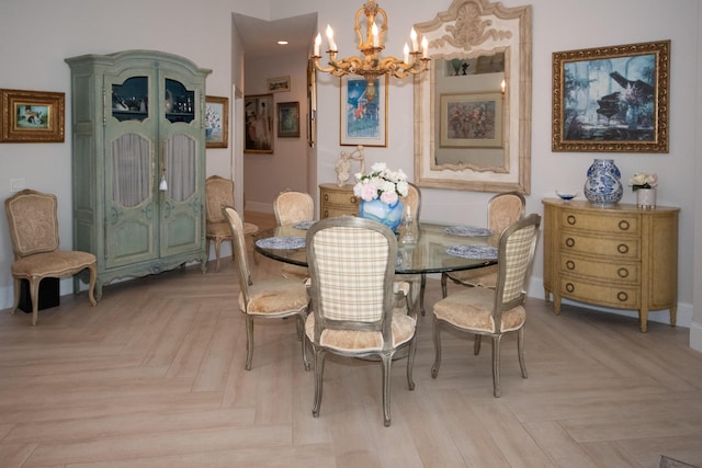 dining area featuring a notable chandelier