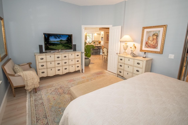 bedroom with light wood-type flooring