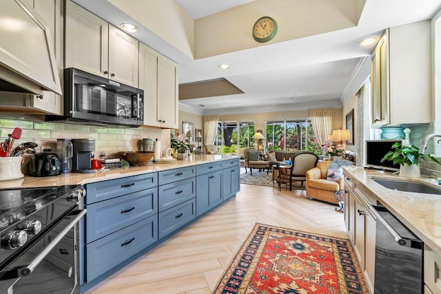 396 Kelsey Park Dr, Palm Beach Gardens, FL 33410 - kitchen featuring black stove, dishwasher, a sink, open floor plan, and ornamental molding