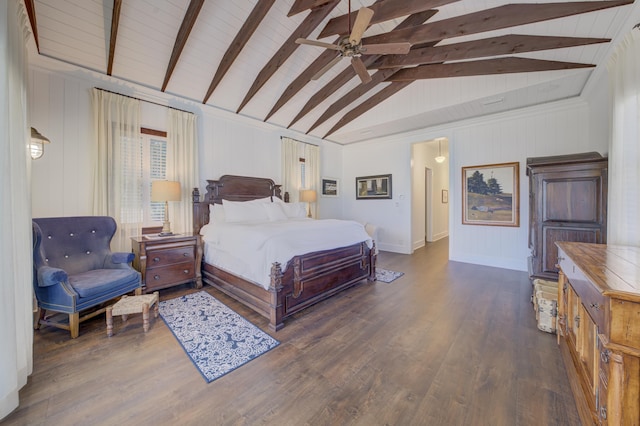 bedroom featuring lofted ceiling with beams, baseboards, wood finished floors, and ceiling fan