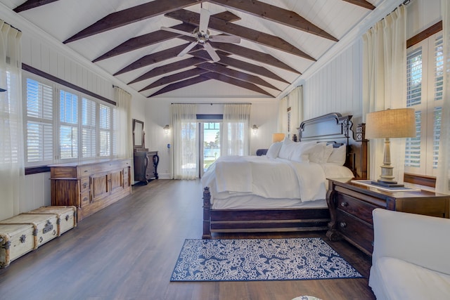 bedroom with wood finished floors and vaulted ceiling with beams