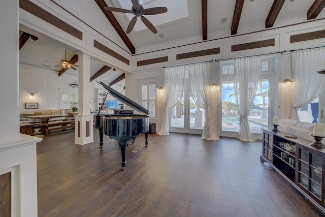 living area featuring lofted ceiling with beams, french doors, ceiling fan, and dark wood finished floors