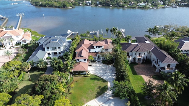 birds eye view of property with a residential view and a water view