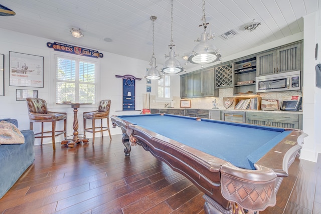 game room featuring dark wood-type flooring, plenty of natural light, wood ceiling, and billiards