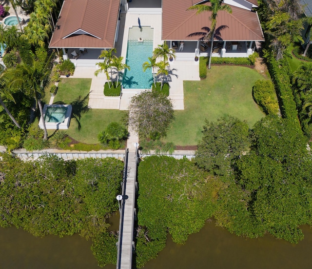 drone / aerial view with a water view