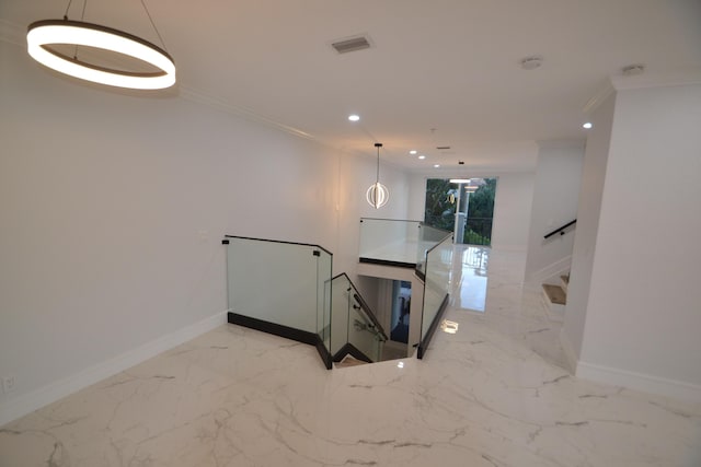 stairway featuring recessed lighting, marble finish floor, crown molding, and baseboards