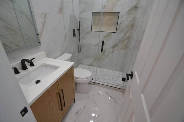 bathroom featuring a marble finish shower, toilet, marble finish floor, and vanity