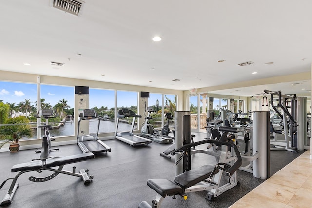 workout area with visible vents and recessed lighting