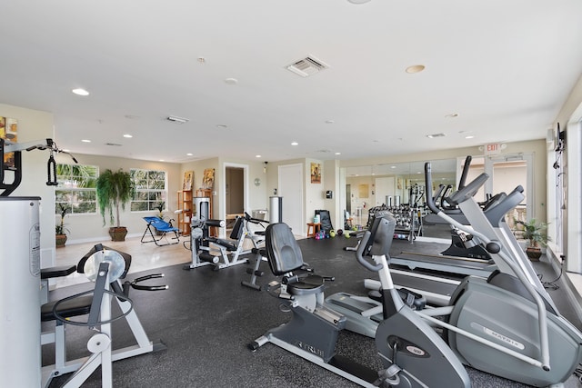 workout area with visible vents, recessed lighting, and baseboards