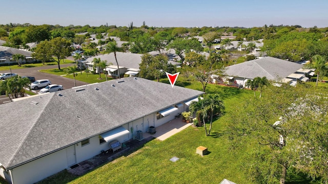 birds eye view of property with a residential view