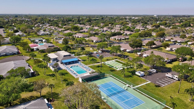 birds eye view of property with a residential view