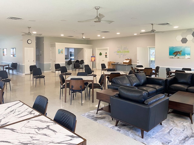 living room with recessed lighting and visible vents