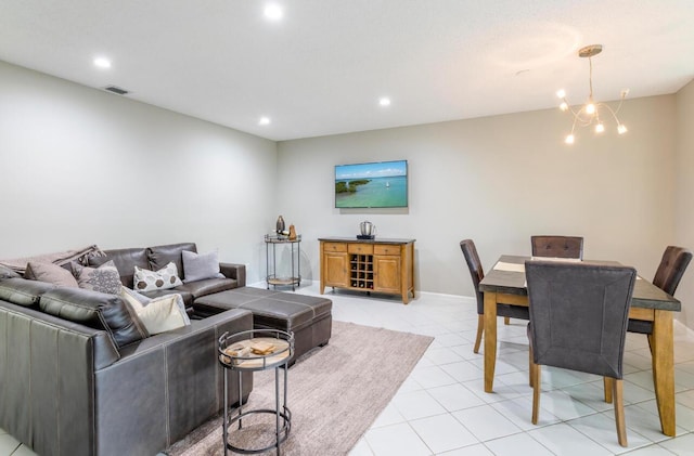 living area with recessed lighting, visible vents, an inviting chandelier, and light tile patterned flooring