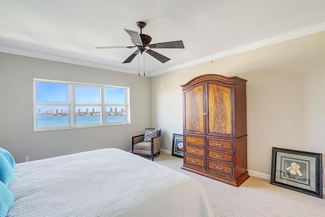 2650 Lake Shore Dr Unit 703, Riviera Beach, FL 33404 - bedroom featuring light colored carpet, baseboards, and ornamental molding