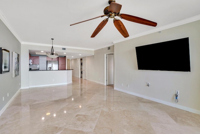 2650 Lake Shore Dr Unit 703, Riviera Beach, FL 33404 - unfurnished living room featuring baseboards, crown molding, and ceiling fan