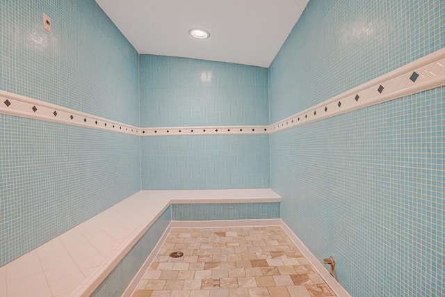 2650 Lake Shore Dr Unit 703, Riviera Beach, FL 33404 - full bathroom featuring tile walls and recessed lighting