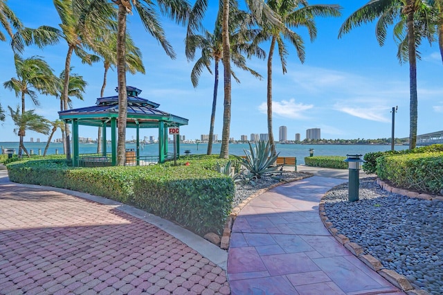 2650 Lake Shore Dr Unit 703, Riviera Beach, FL 33404 - view of home's community with a water view and a gazebo