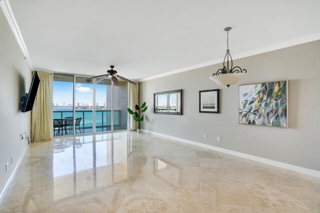 2650 Lake Shore Dr Unit 703, Riviera Beach, FL 33404 - unfurnished room with expansive windows, baseboards, ornamental molding, and ceiling fan