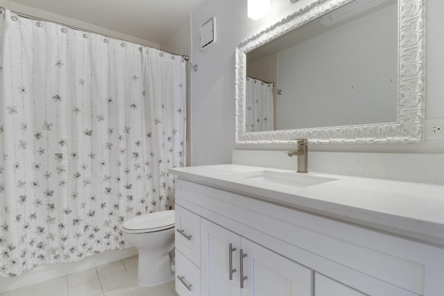 full bathroom with tile patterned flooring, a shower with shower curtain, toilet, and vanity