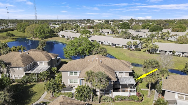 aerial view with a residential view and a water view