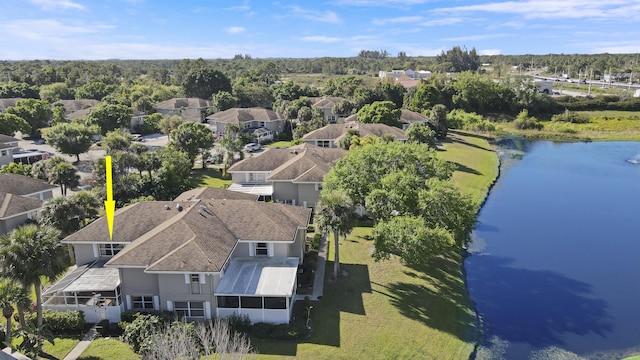 bird's eye view with a water view