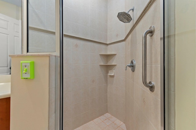 bathroom with a shower stall