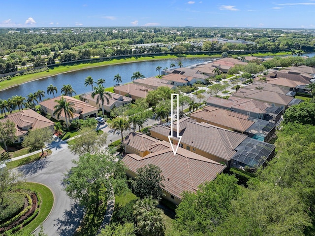 birds eye view of property featuring a residential view and a water view