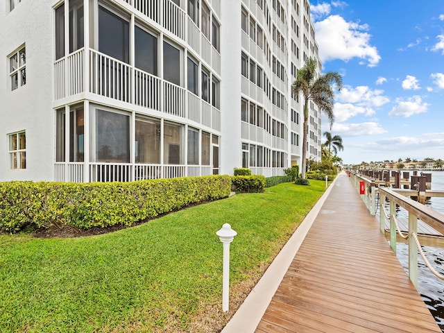 dock area with a yard