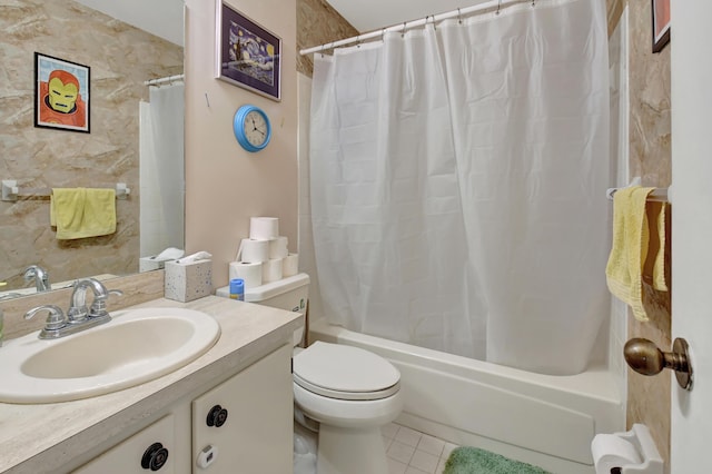 full bath with vanity, tile patterned floors, toilet, and shower / bathtub combination with curtain