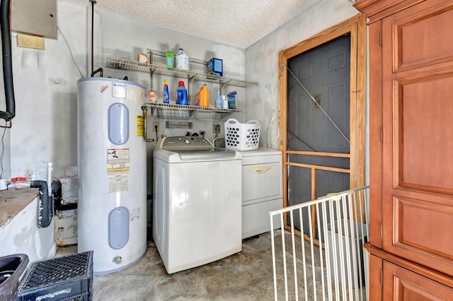 laundry area with laundry area, washer and dryer, a textured ceiling, and electric water heater