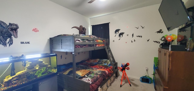 bedroom featuring ceiling fan and carpet floors