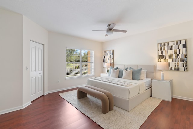 826 Dakota Dr Unit 105, Jupiter, FL 33458 - bedroom with wood finished floors, baseboards, and a ceiling fan