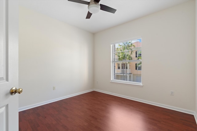 826 Dakota Dr Unit 105, Jupiter, FL 33458 - unfurnished room with wood finished floors, a ceiling fan, and baseboards